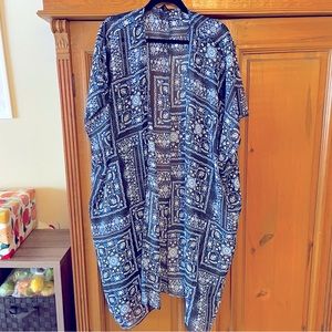 Part shawl part kimono. This over piece works over tank or tee.